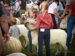 Children show sheep at the 2019 Glencoe Fall Fair. The 2020 edition has been cancelled due to the COVID-19 pandemic. (Supplied)