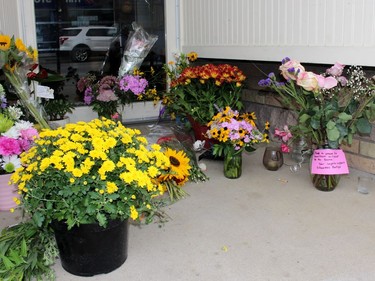 A memorial was set up in front of the downtown retail store Cowboys + Indians after owner Jim Wilson was identified as the victim of a homicide by police on Tuesday September 1, 2020 in Sarnia, Ont. Terry Bridge/Sarnia Observer/Postmedia Network