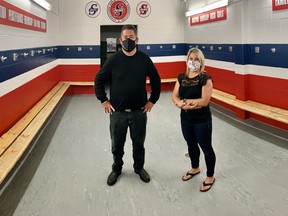 The Stratford Minor Girls' Hockey Association now has two dedicated rooms at the Rotary Complex for its Aces players. Pictured are association vice-president Scott Wildgust, left, and board member Amy Taylor. Cory Smith/The Beacon Herald