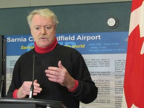 Paul Morden/Sarnia Observer Sarnia Mayor Mike Bradley speaks in March 2019 at a federal funding announcement for new asphalt and airfield guidance signs at the city-owned Sarnia Chris Hadfield Airport. Since the loss of Air Canada service earlier this year, the city is no longer eligible for federal infrastructure funding and a recent economic report suggests modifying operations at the 1950s-built airport or selling it off.