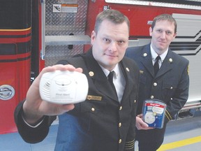 File photo/Postmedia Network Sarnia Fire Chief Brian Arnold is shown in this file photo promoting use of carbon monoxide detectors in a previous post as Woodstock's deputy fire chief. Arnold's last day on the job in Sarnia is Oct. 21, city officials announced Tuesday.