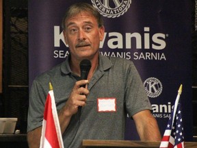 Barry Bentley with Hughes Intelligence speaks with Seaway Kiwanis Sarnia Club members about a new security camera system coming to the Children's Animal Farm in Canatara Park. Nightly security patrols are also part of the donation. (Tyler Kula/The Observer)