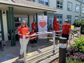 Officials with Shell's Corunna refinery helped spread some cheer at Residence on the St. Clair retirement home in Sarnia recently, as part of Shell's ongoing Fuelling Kindness program. Pictured, from left, decorating the premises are: summer student Samantha Iaccino, environmental specialist Crystal Purdy, and summer students Taylor Scott, Zach Matias, and Nick Hackwell. (Submitted)