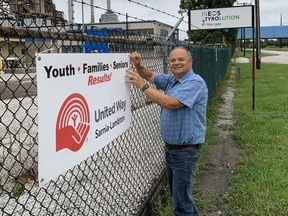 Dave Brown installs the first of several United Way signs this fall promoting the 2020 Campaign on the fence at INEOS Styrolution, one of the first employee campaigns to kickoff this fall.  The United Way has reached the 17% mark of the $1,900,000 Needs Target for this year.