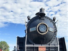 MP Marc Serre tours the Northern Ontario Railroad Museum and Heritage Centre in Capreol with the help of a summer student.