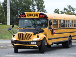 A school bus departs after dropping students off at Walden Public School in Lively, Ont. on Tuesday September 8, 2020.