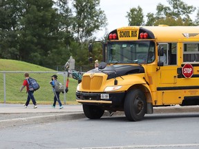 A school bus drops students off at Walden Public School in Lively, Ont. on Tuesday September 8, 2020.