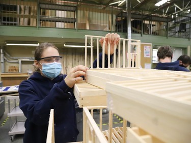 Student Kayleigh Larocque dismantles a project at a Grade 10 shop class at Ecole secondaire du Sacre-Coeur in Sudbury, Ont. on Tuesday September 8, 2020. John Lappa/Sudbury Star/Postmedia Network