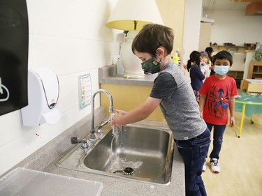 A kindergarten student washes his hands prior to a nutrition break at MacLeod Public School in Sudbury, Ont. on Tuesday September 8, 2020. John Lappa/Sudbury Star/Postmedia Network