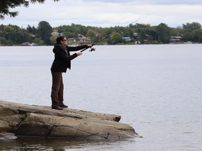 Melanie St-Cyr fishes off a point at Ramsey Lake in Sudbury, Ont. on Thursday September 10, 2020.