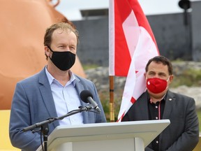 Sudbury MP Paul Lefebvre, left, and Nickel Belt MP Marc Serre are shown in this  file photo.