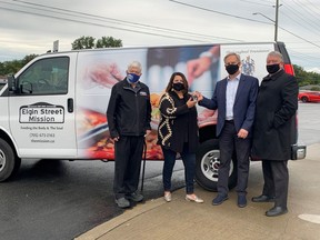 Vince Pollesel, Crosstown GMC, and Gerry Lougheed, The Lougheed Foundation, present the keys of a new GMC Cargo Van to Gary Newbury of the Elgin Street Mission. Supplied photo