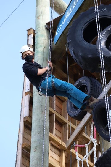 Fourth-year student Ben Kovala takes part in a climbing rescue course on the challenge tower at Laurentian University in Sudbury, Ont. on Friday September 18, 2020. Students in the Outdoor Adventure Leadership program participated in the course. John Lappa/Sudbury Star/Postmedia Network