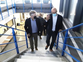 Don Duval, right, CEO of NORCAT, gives a tour of the facility for Ontario Finance Minister Rod Phillips in Sudbury, Ont. on Friday September 18, 2020.