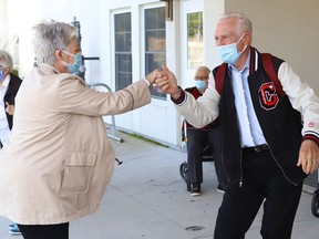 Maurice and Linda Obonsawin show off their dancing skills as Finlandia Village townhouse residents and staff dance up and down a street at Finlandia in Sudbury, Ont. on Tuesday September 22, 2020. Fitness centre staff organized the event to provide residents with exercise and a social connection during the COVID-19 pandemic.
