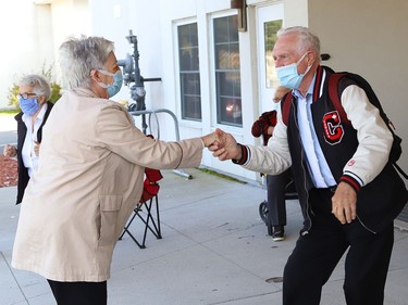 Maurice and Linda Obonsawin show off their dancing skills as Finlandia Village townhouse residents and staff dance up and down a street at Finlandia in Sudbury, Ont. on Tuesday September 22, 2020. Fitness centre staff organized the event to provide residents with exercise and a social connection during the COVID-19 pandemic. John Lappa/Sudbury Star/Postmedia Network