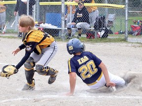 Ben Kawa (20) of the Valley East Voyageurs U11 baseball team slides in to home past the Muskoka catcher at Terry Fox Sports Complex in Sudbury, Ontario on Saturday, September 19, 2020. Ben Leeson/The Sudbury Star/Postmedia Network