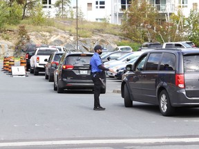 There was a steady stream of vehicles as community members lined up to be tested at the drive-thru COVID-19 Assessment Centre at 56 Walford Road in Sudbury, Ont. on Tuesday September 29, 2020.