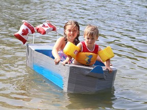 Meikayla Cronier, 10, and her brother, Jase Plouffe, 4, test Jase's cardboard boat at Meatbird Lake Park in Lively, Ont. on Friday August 17, 2018. Vale wants to buy the park.