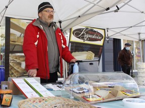 Denis Nadeau, manager of sales and marketing with the Fromagerie Kapuskoise, was busy providing information about the company's artisan cheeses to customers at his booth during the Downtown Timmins: BIA Urban Park Market on Thursday. The season is quickly winding down, with only a few more weeks left for the popular market. RICHA BHOSALE/THE DAILY PRESS