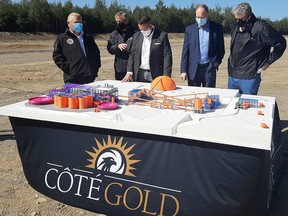 Officials look over a scale model of IAMGOLD's new Côté Gold open pit mine during a ceremony on Friday. Among those attending the ceremony were Prime Minister Justin Trudeau and Ontario Premier Doug Ford. It is estimated the project, a 70/30 joint venture between IAMGOLD and Sumitomo Metal Mining Co. Ltd., will create 450 jobs and generate $10 billion in GDP once it is up and running. COLLEEN ROMANIUK/LOCAL JOURNALISM INITIATIVE