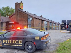 The parking lot around the Super 8 Motel in Timmins where an assault involved an "edged weapon" was contained Wednesday morning while forensic officers with the Timmins Police Service collected evidence from the scene. Two men were taken to hospital with injuries while a third individual, the male suspect, was being sought by police. 

Supplied