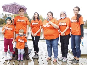 In this photo taken, Sept, 30, 2020, Timmins Native Friendship Centre staff and some of their family members took part in a walk to Gillies Lake to honour residential school survivors as a part of the Orange Shirt Day event on Wednesday morning. Among those who attended were Andrea Jolly with her daughters Haven, 8 and Ariaya, 4, from left, Amber McComb, Julie Fortin, Doreen Innes and Shannon Auger.

RICHA BHOSALE/The Daily Press