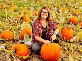 Jessica Durka was welcoming visitors to Waterford to get their pumpkins as part of an annual fundraiser for the Juravinski Cancer Centre in Hamilton. Monte Sonnenberg/Postmedia Network