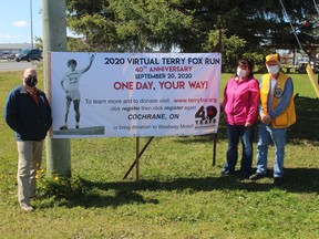 Peter Politis, Terese Tremblay and Findlay Barr of the Cochrane Lions club stand next to the new Terry Fox Banner for 2020. They hope that a large number of Cochrane residents will participate in this year's run to raise money for cancer research.TP.JPG