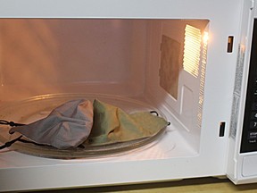 Heating a face mask in a microwave, in an effort to decontaminate it is a potential fire risk..TP.jpg