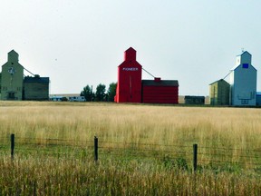 The exterior of one of Mossleigh's former grain elevators, the middle one, has recently been restored. STEPHEN TIPPER