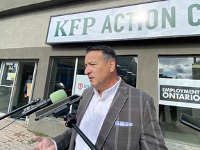 Kenora-Rainy River MPP Greg Rickford speaks to reporters outside the newly opened Kenora Forest Products Action Centre on Matheson Street on Thursday, Sept. 3.