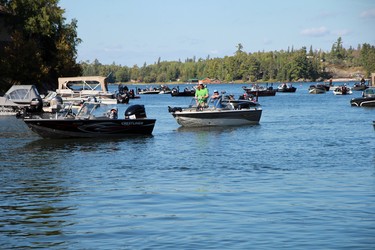 A familar sight during weigh-ins, anglers load the bay near Government Dock in Sioux Narrows on the second day of the 24th annual Bassin' For Bucks fishing tournament on Saturday, Sept. 12.