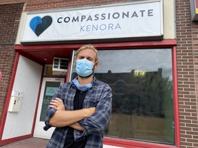 Dr. Jonny Grek stands outside of the new downtown clinic on Main Street.