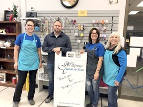 Local Rotarians, l-r, Sarah Letkeman, Sheldon Ward, 
Holly Astill and Gwen Dionne volunteered at Wellspring's Twice is Nice store recently. Club members volunteer at a number of different organizations in Whitecourt.