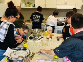 The ECHO Society cooks meals with the Collective Kitchen in Whitecourt.