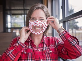 Cheryle Trofimuk puts on a reusable mask that has a window in it allowing the mouth to be seen. Trofimuk has been deaf since birth and relies on rip leading to communicate with others.
Brigette Moore