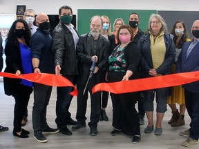 Bill Mozer and Vyktorya Beson were joined by Wetaskiwin City Council members, members of the Leduc-Wetaskiwin Regional Chamber of Commerce and other supporters to cut the ribbon on Wetaskiwin Water Works Studios last week.