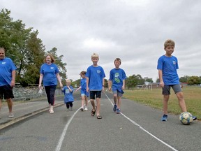 Greg and Anita D'Hulster, on the left, walked with five of their grandchildren in Tillsonburg for Sunday's annual Kidney Walk. Their Dyl-Pickles team raised more than $4,000. (Chris Abbott/Norfolk Tillsonburg News)