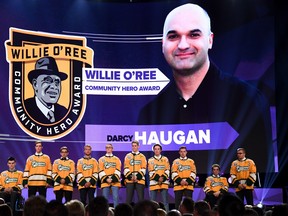 Members of the Humboldt Broncos stand onstage as Darcy Haugan is presented with the Willie O’Ree Community Hero Award at the 2018 NHL Awards in Las Vegas. The Darcy Haugan Memorial Statue will be unveiled on Oct.10 at the Baytex Centre in Peace River. The former head coach of the North Peace Navigators and Humboldt Broncos won five North West Junior Hockey League titles in his tenure with the Navigators.