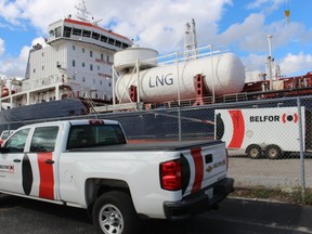 A Belfor Property Restoration Truck is shown parked at Sarnia Harbour next to the Damia, a ship where five crew members tested positive for COVID-19.