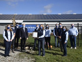 MPP Ernie Hardeman presented the team at Burnbrae Farms in Norwich with the top prize in this year's Excellence in Agriculture awards. (Kathleen Saylors/Woodstock Sentinel-Review)