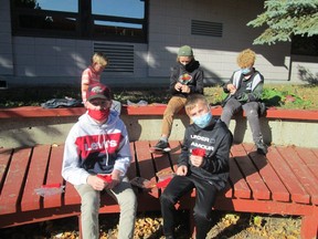 Students from Fairview made tobacco bundles during their Aboriginal Studies class to be used for the Sisters in Spirit event.