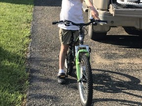 Alex Ross,8, cycled 200 kilometres and raised over 600 dollars for cancer research. Alex Ross is a student at E.E. Oliver Elementary School.