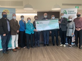 Caisse Alliance has donated a total of $100,000 to Nipissing Serenity Hospice. Caisse donated $50,000 previously when the hospice was being built and topped up its donation, Tuesday, by providing another $50,000 to help with operational expenses. Jennifer Hamilton-McCharles/The Nugget