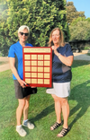 The Delhi Golf and Country Club hosted its annual Ryder and Solheim Cup events in September. Out-of-town captain Melanie Ruel accepted the winning plaque from organizer Patsy Hoto at the course on Sept. 27. (CONTRIBUTED)