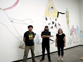 Members of the Z’otz Collective stand in front of their third story mural at the Judith & Norman Alix Art Gallery. Their exhibition – entitled Ode to the Inside Out Questions – runs until March 2021. From left are Nahum Flores, Erik Jerezano and Ilyana Martinez. Carl Hnatyshyn/Sarnia This Week