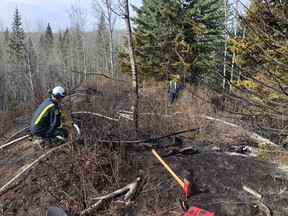 Crews deal with the wildland fire discovered along Kleskun Creek east of Teepee Creek on Tuesday, Oct. 6, 2020.