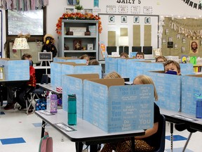 Students sit in class at St. Marguerite Catholic School in Spruce Grove earlier this month. The school recently did a walkthrough with division representatives and Spruce Grove-Stony Plain UCP MLA Searle Turton.