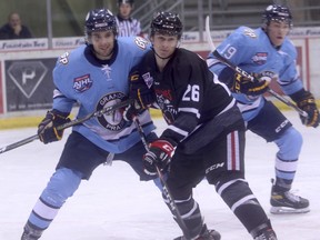 Grande Prairie Storm defender Juliano Santalucia and Whitecourt Wolverines forward Dylan Leslie battle for space in the Storm end after a faceoff. The Storm opened the home portion of the Alberta Junior Hockey League pre-season with a 6-3 loss to the Wolverines on Saturday night at Revolution Place. On Friday, the clubs opened the schedule in Whitecourt, the locals earning a 4-2 win. The two teams will re-engage Friday night at Revolution Place.